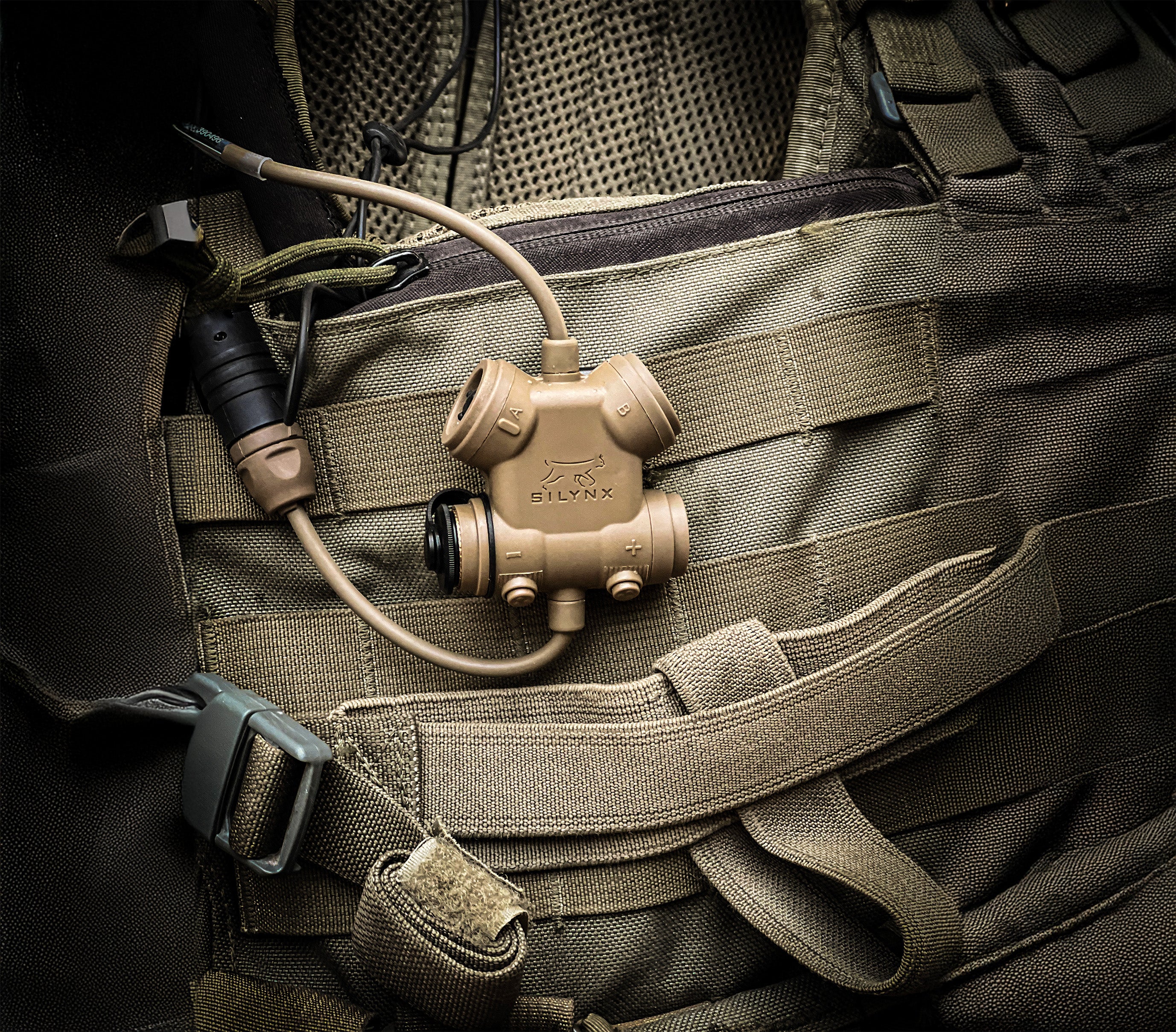 Tactical vest with a SILYNX clarus attached
