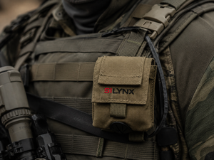 Molle headset pouch with Silynx' branding on a tactical vest