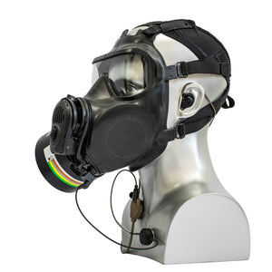 Black gas mask with Silynx communication headset Adaptor on a white mannequin head