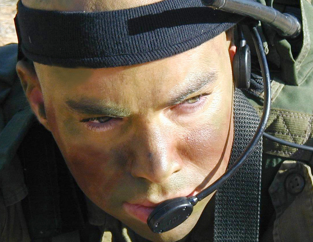 A Soldier withSilynx Eagle headset attached to a headband.