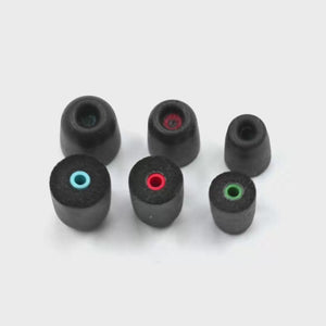 Three sizes of Silynx black foam earplugs on a white background